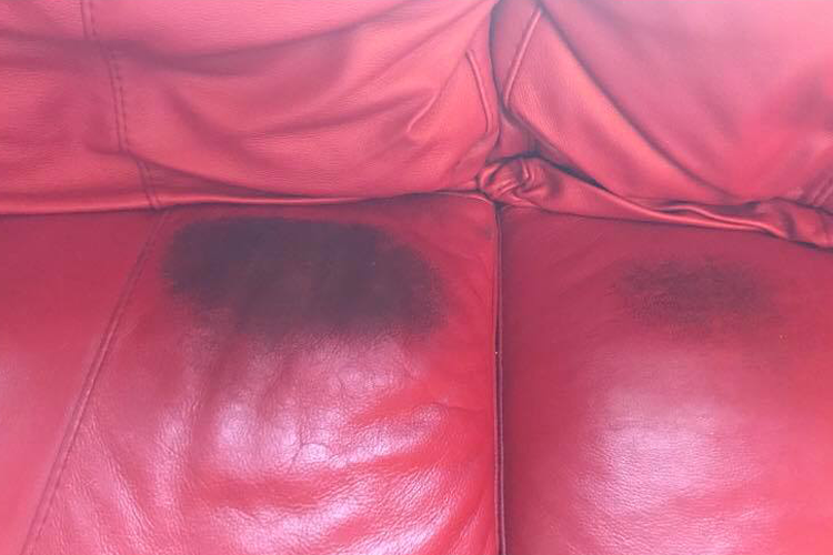 red leather sofa before repair