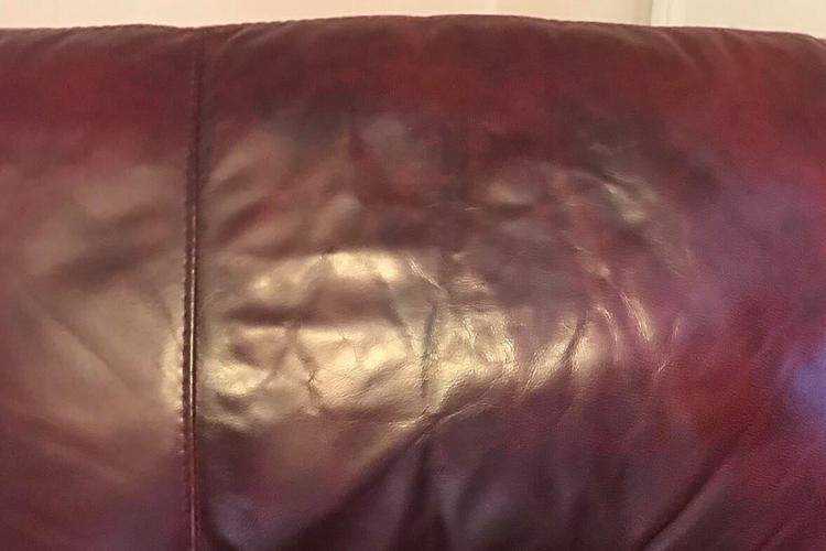 Second red leather sofa after repair