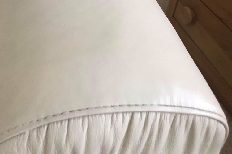 White leather sofa after repair